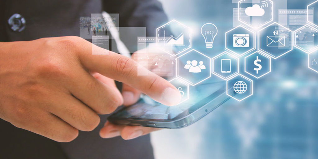 businessman using his phone to create a social media marketing plan