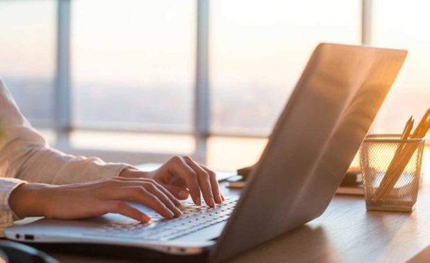 writer performing content generation by creating a blog for a website