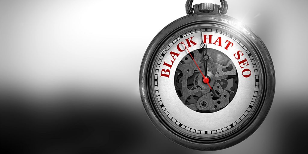 a clock with the words Black Hat SEO on it that belongs to a risky digital marketing firm who employs bad SEO techniques
