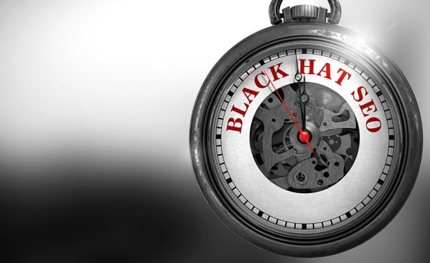 a clock with the words Black Hat SEO on it that belongs to a risky digital marketing firm who employs bad SEO techniques