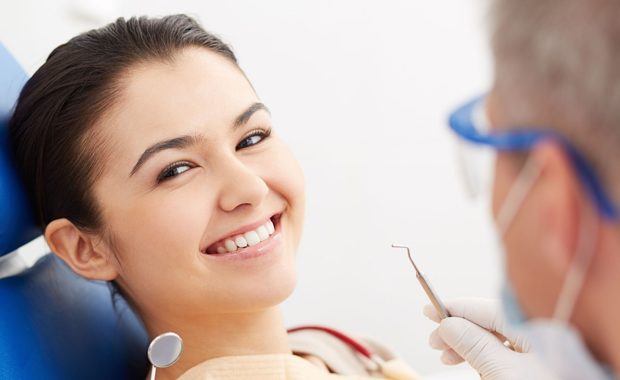 a dentist whose patient list has drastically increased due to effective digital marketing services