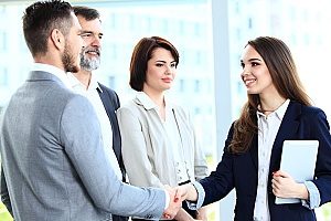 a digital marketing agency meeting with the CEO of an insurance agency in order to discuss a good digital marketing strategy