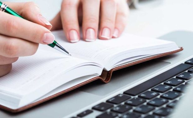 a person writing content in order to employ great inbound marketing strategies and generate new and more business leads than before