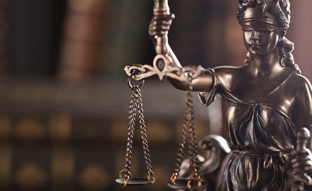 an attorney statue that represents how a small law firm marketing strategy has benefitted the attorney and his firm