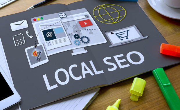 a gray book that shows an infographic about local SEO which is crucial for any insurance digital marketing strategy