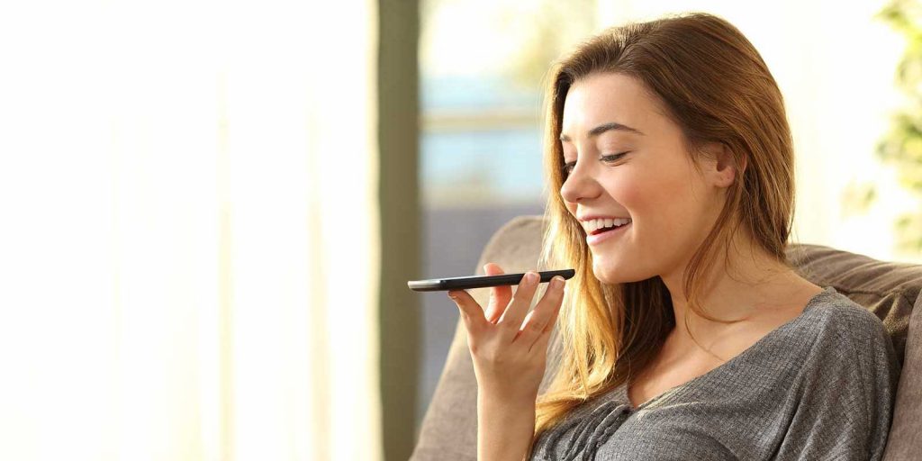 girl getting answers from voice search after business utilized voice search optimization