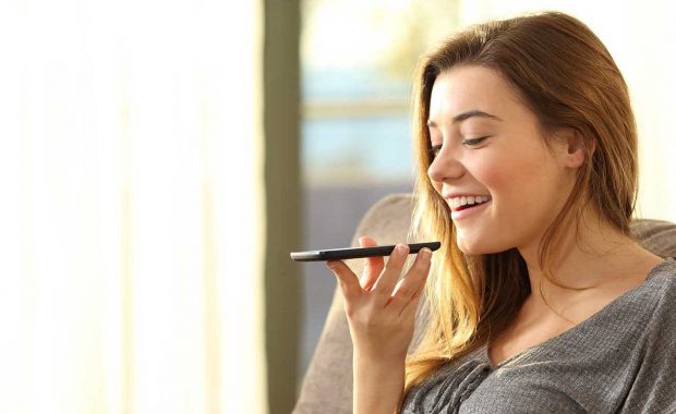 girl getting answers from voice search after business utilized voice search optimization