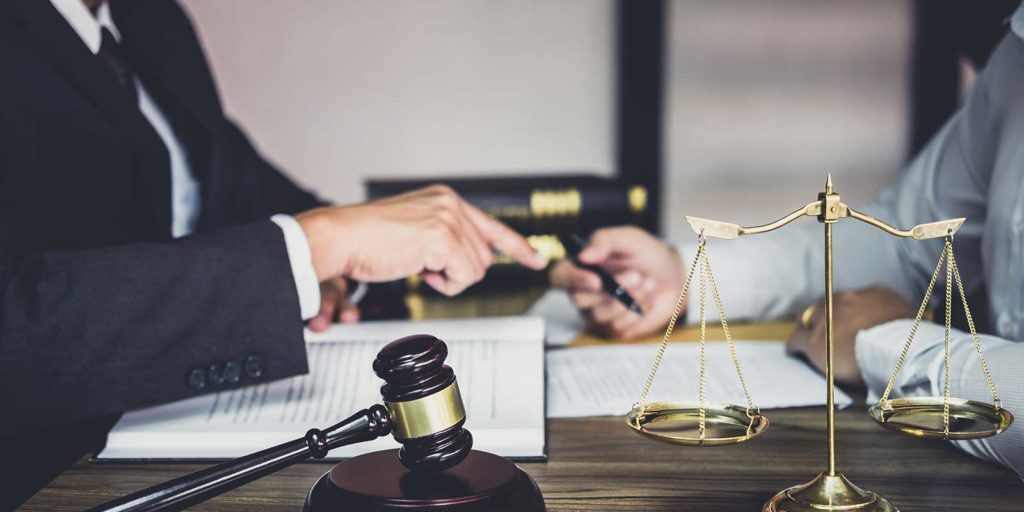 Attorneys reviewing the top law firm marketing strategies of 2020