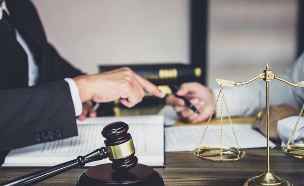 Attorneys reviewing the top law firm marketing strategies of 2020