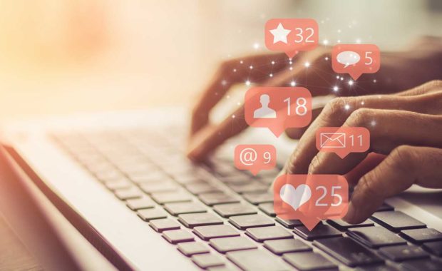 Attorney checking on his law firm social media marketing campaign