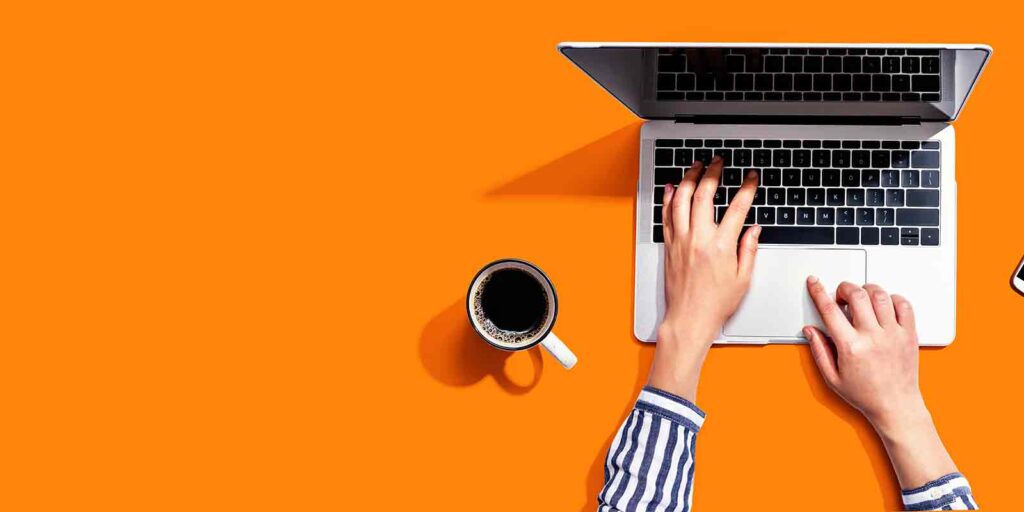 person on computer looking up domain authority