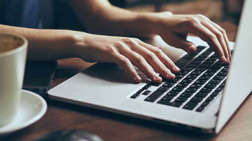 person writing for content marketing