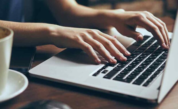 person writing for content marketing