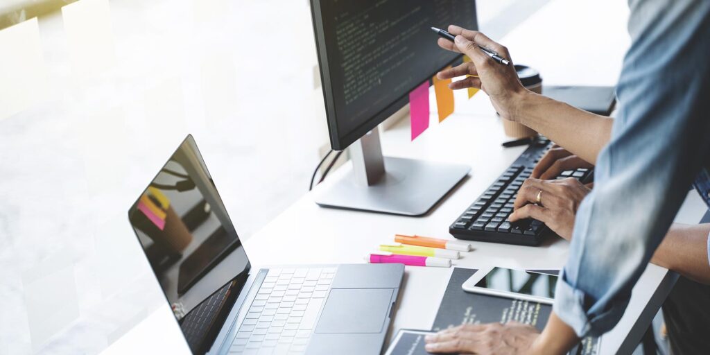 two people on the computer
