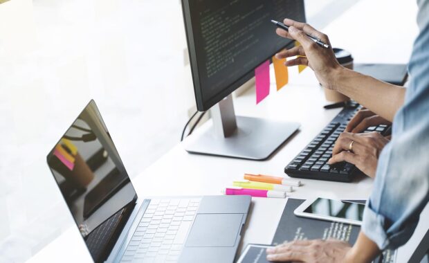 two people on the computer