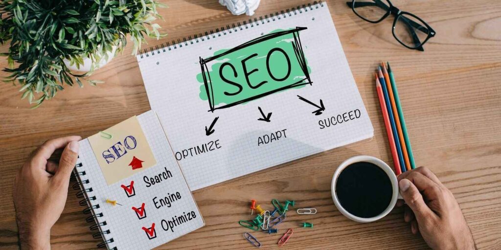 developer with SEO ideas in notebooks at workplace