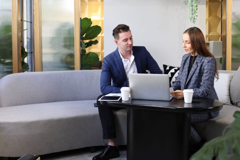 Male business owner meeting with insurance agent