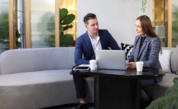 Male business owner meeting with insurance agent