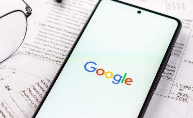 google logo on phone screen stock image
